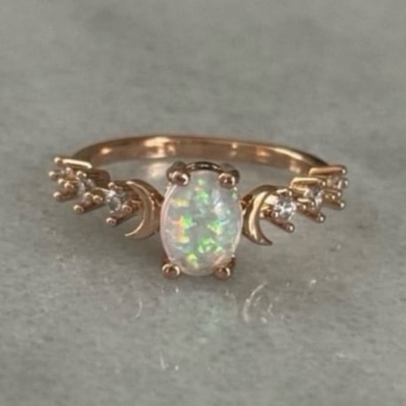 Modest Lu Jewelry - Rose Gold Opal Moon Crystal Ring Size 7 Brand New
Brand New